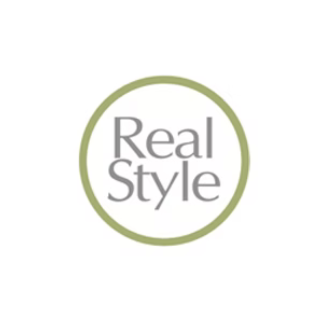 Logo with the text 'Real Style' inside a green circle.