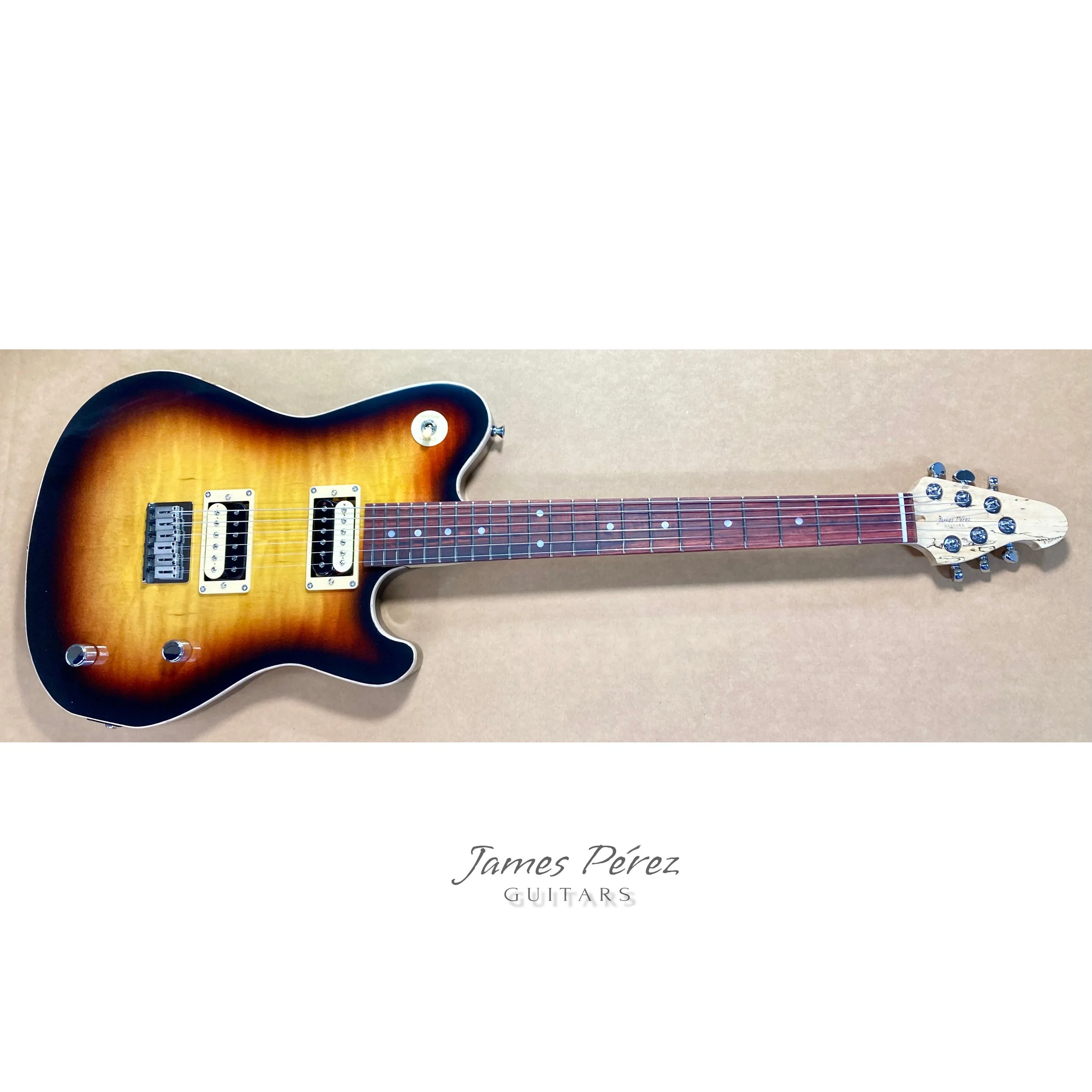 Electric guitar with a sunburst finish, two humbucker pickups, a wooden neck, and a white headstock, laying on a brown background with the text "James Pérez Guitars" underneath.