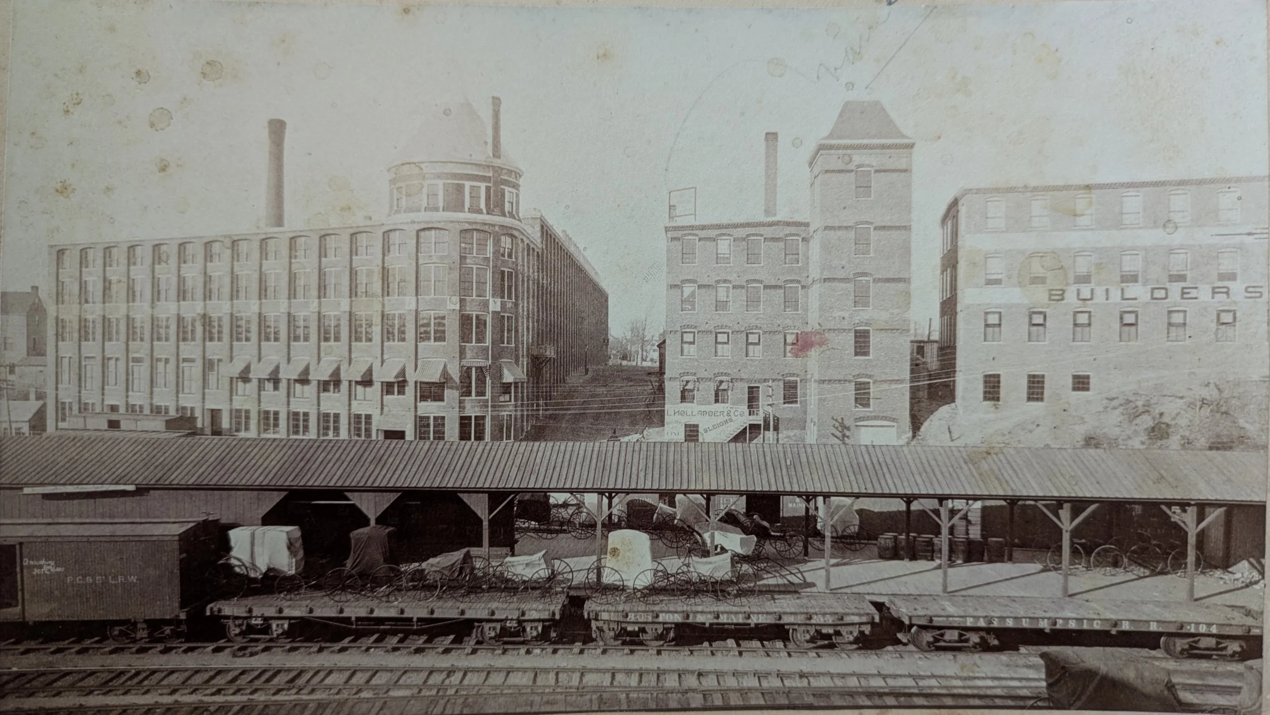 The John H. Clarke Company (2 buildings on right). This view is looking up Chestnut St. The building on the left is gone, now the location of N.A. Nichols scrap metal company.