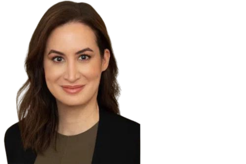 Woman smiling in brown shirt and black jacket