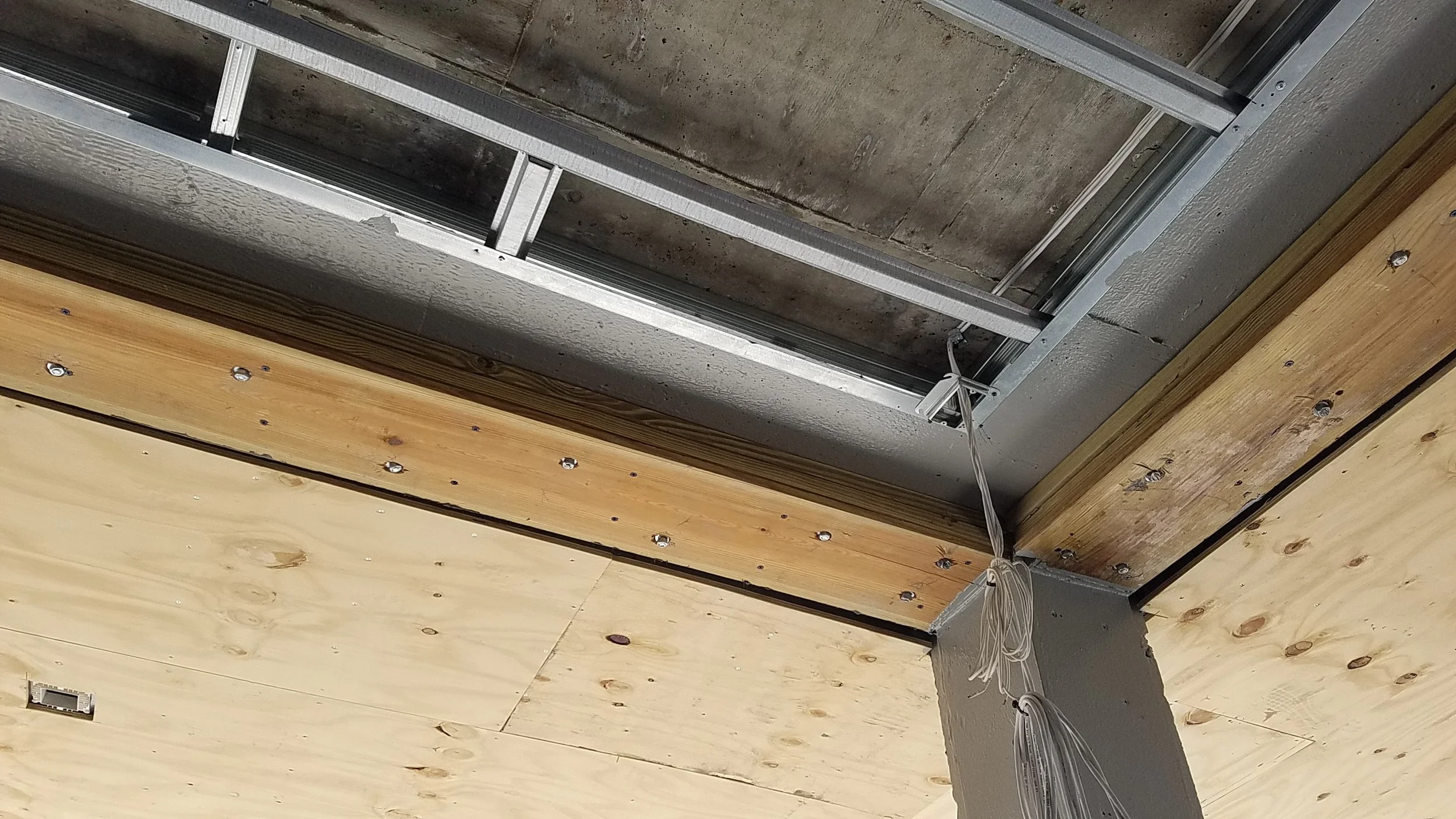 Triple 2x bucks to bring the door heads to align with the lower beams on the other side of the house.