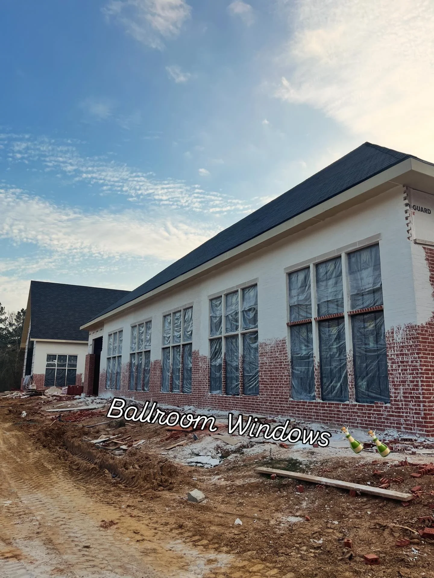 Brick crews doing a great job with stonework above the ballroom windows. Great views outside and in.