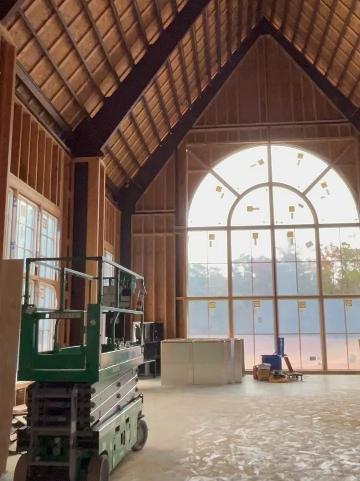 So excited to preview our beautiful (massive) chapel window. Overlooking the pond and the pines behind it, this is the perfect backdrop for one of life&rsquo;s biggest moments.

+ bonus photo of one of our framers who helped bring it to life, for sca