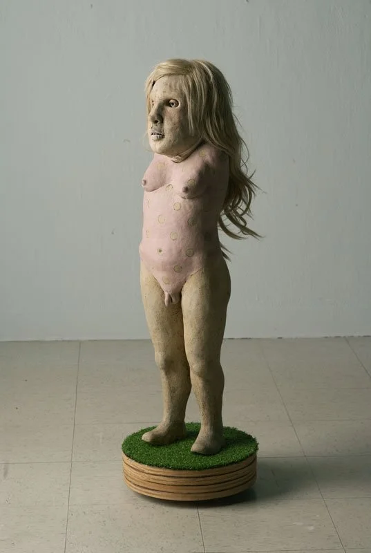 Wildboy, ceramic/wood/fake grass/wig/barrette, 42” x 14”x 12,” 2003