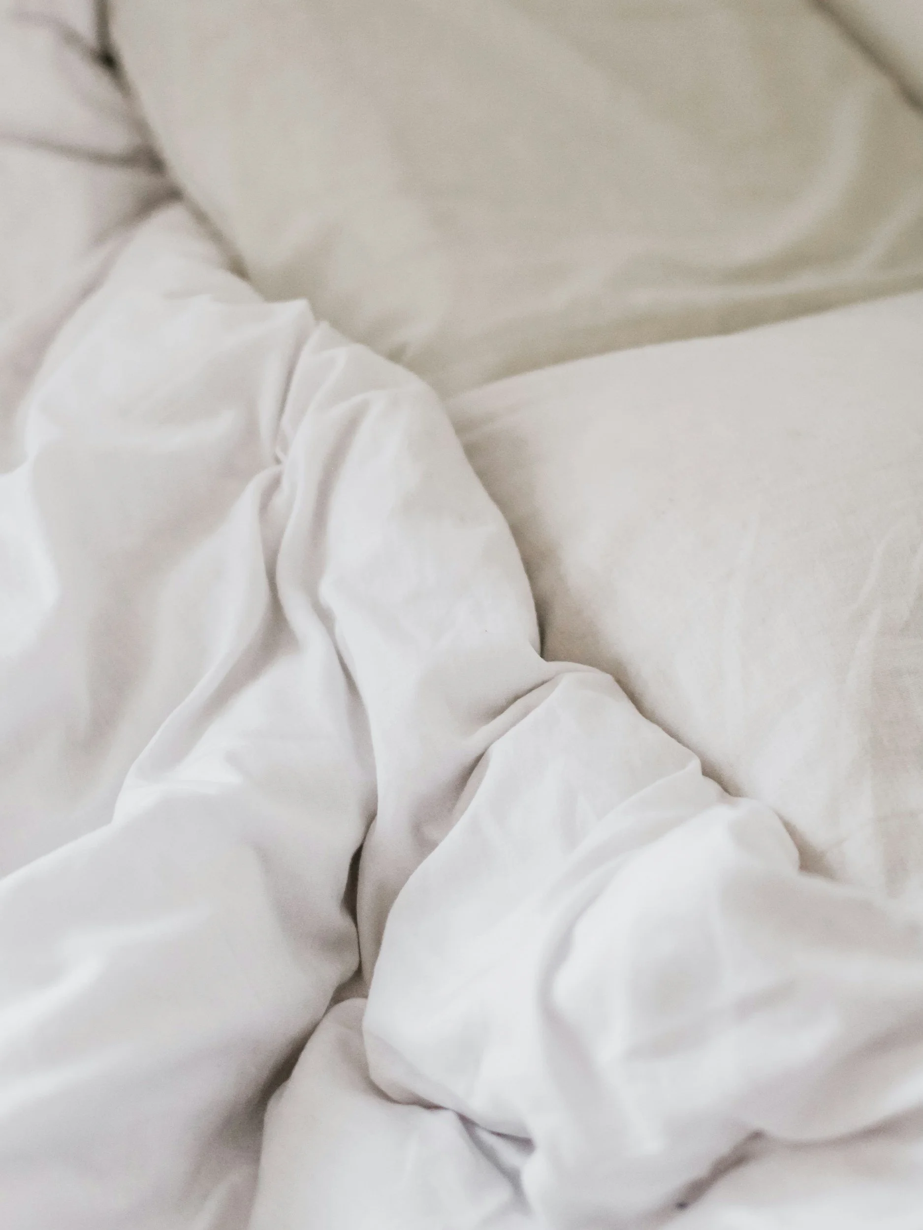 white sheets crumpled from use