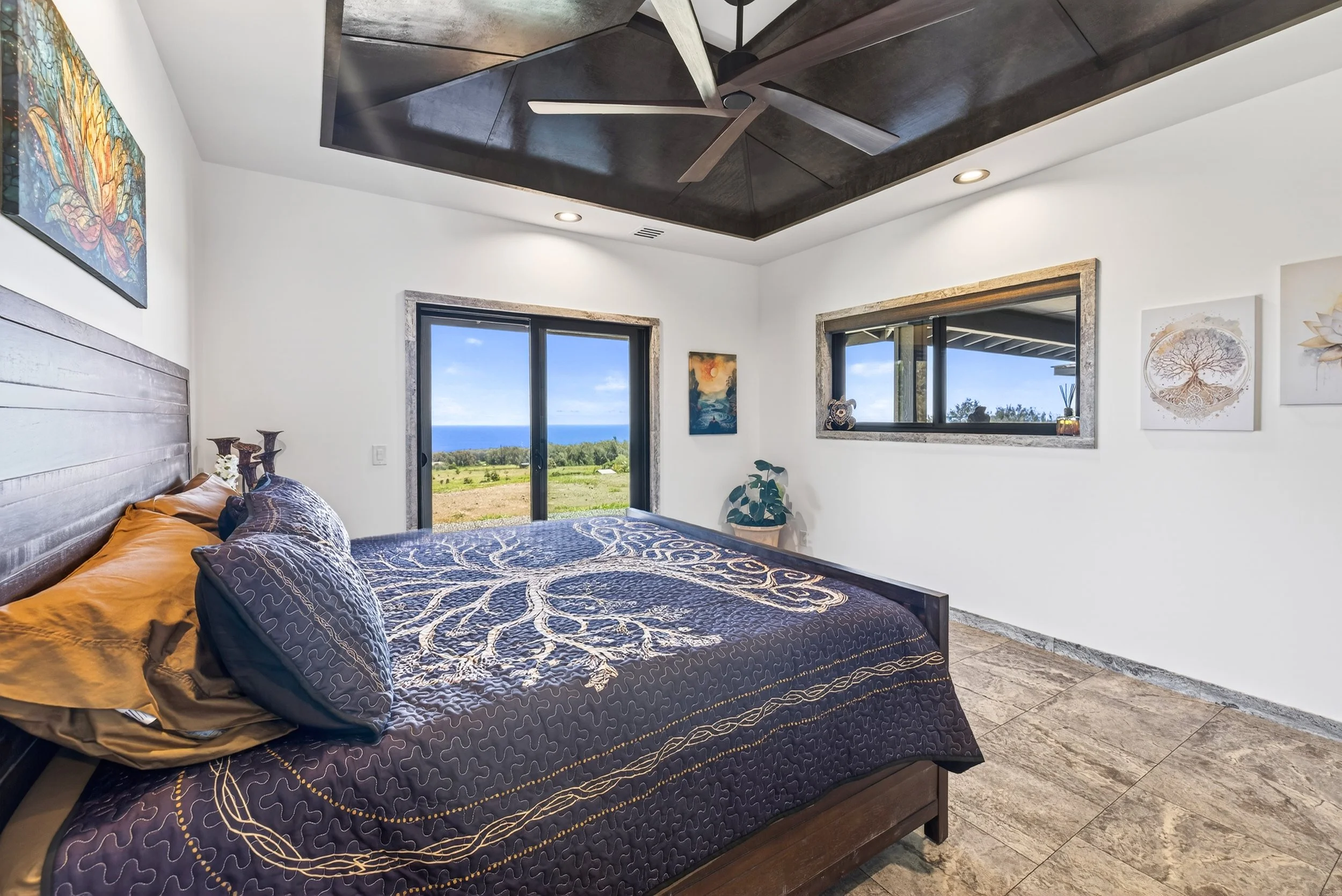 King bedroom with ocean views at Stargate Farm Hawaii luxury rental