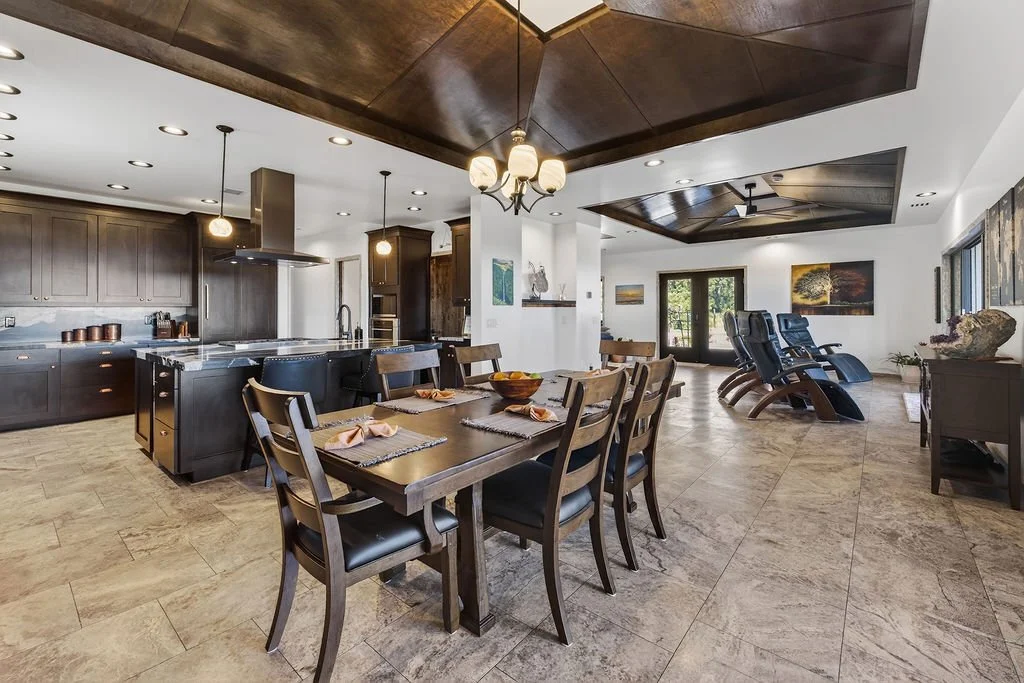 Dining area with ocean views at Stargate Farm luxury vacation home Big Island Hawaii