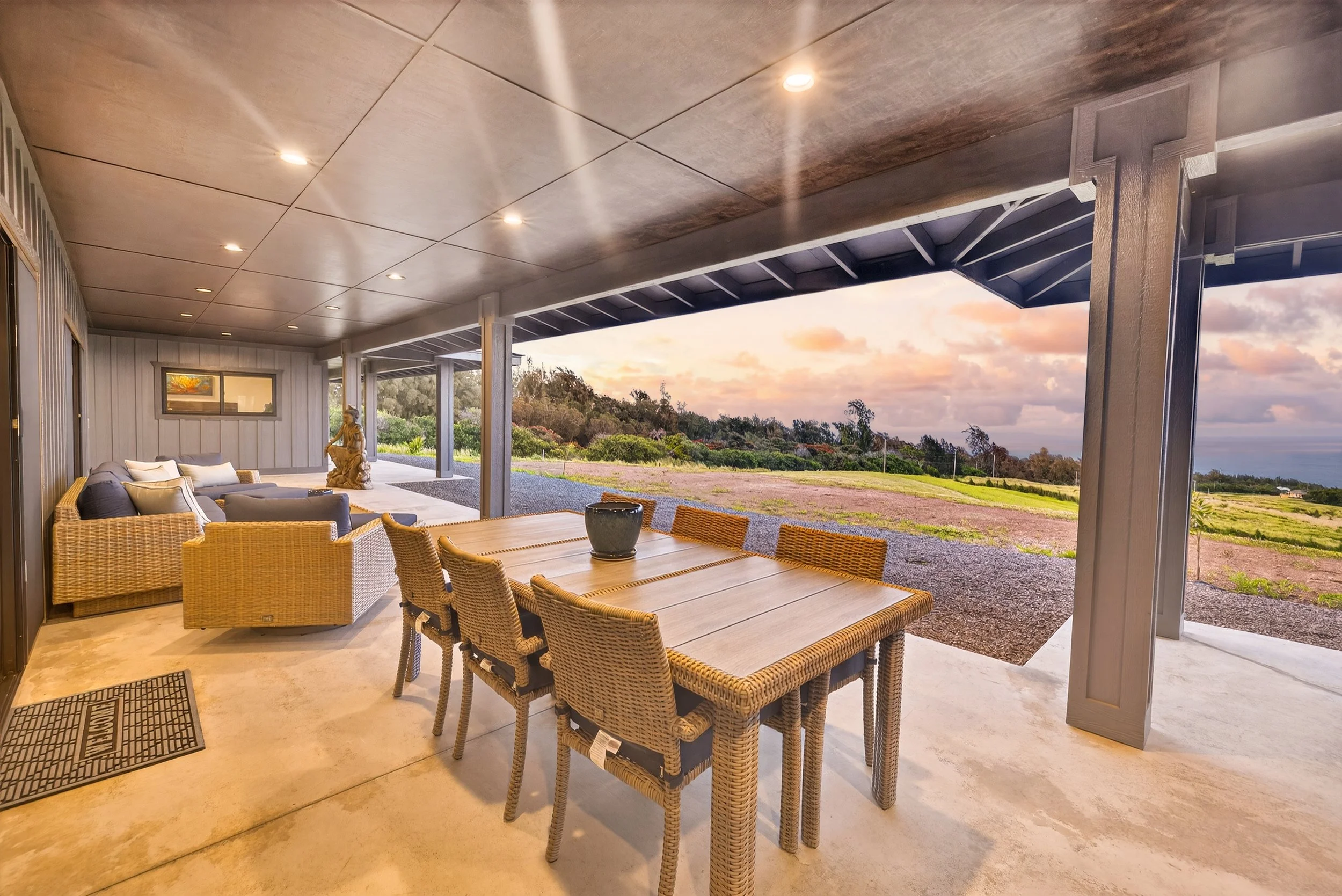 Alfresco dining area with ocean views at Stargate Farm luxury vacation rental North Kohala Hawaii
