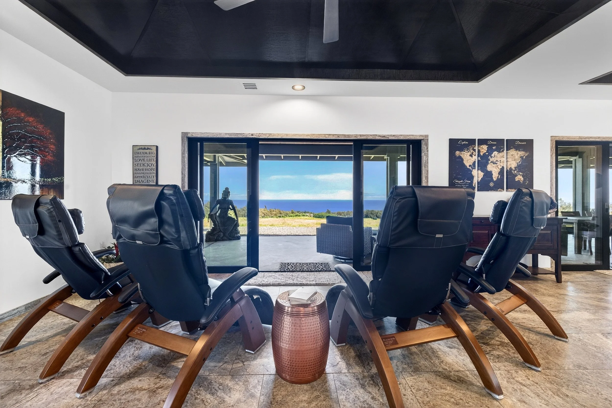 Indoor recliners overlooking the ocean at Stargate Farm luxury rental North Kohala Hawaii