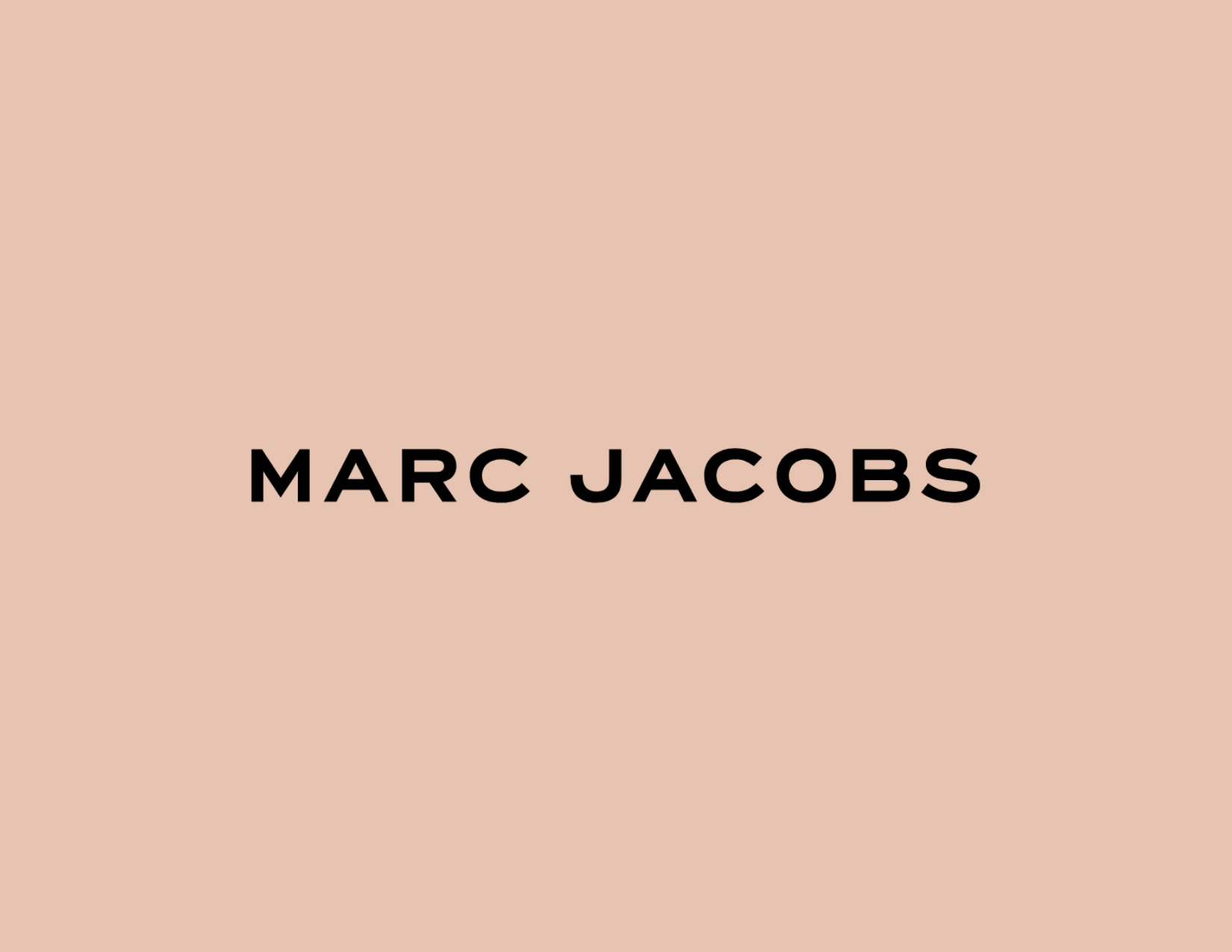 Marc Jacobs logo on a light peach background.