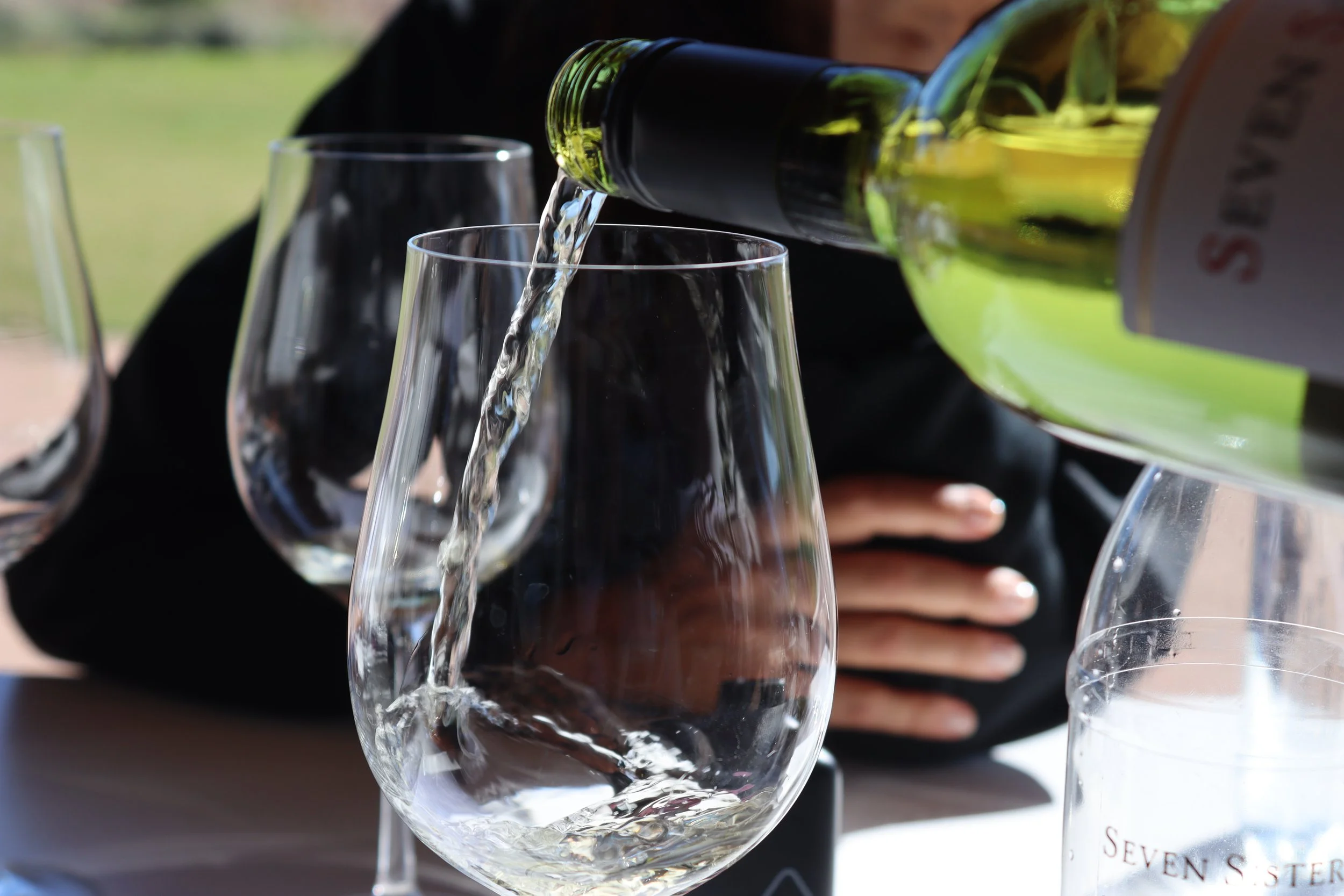 An action shot of wine being poured.