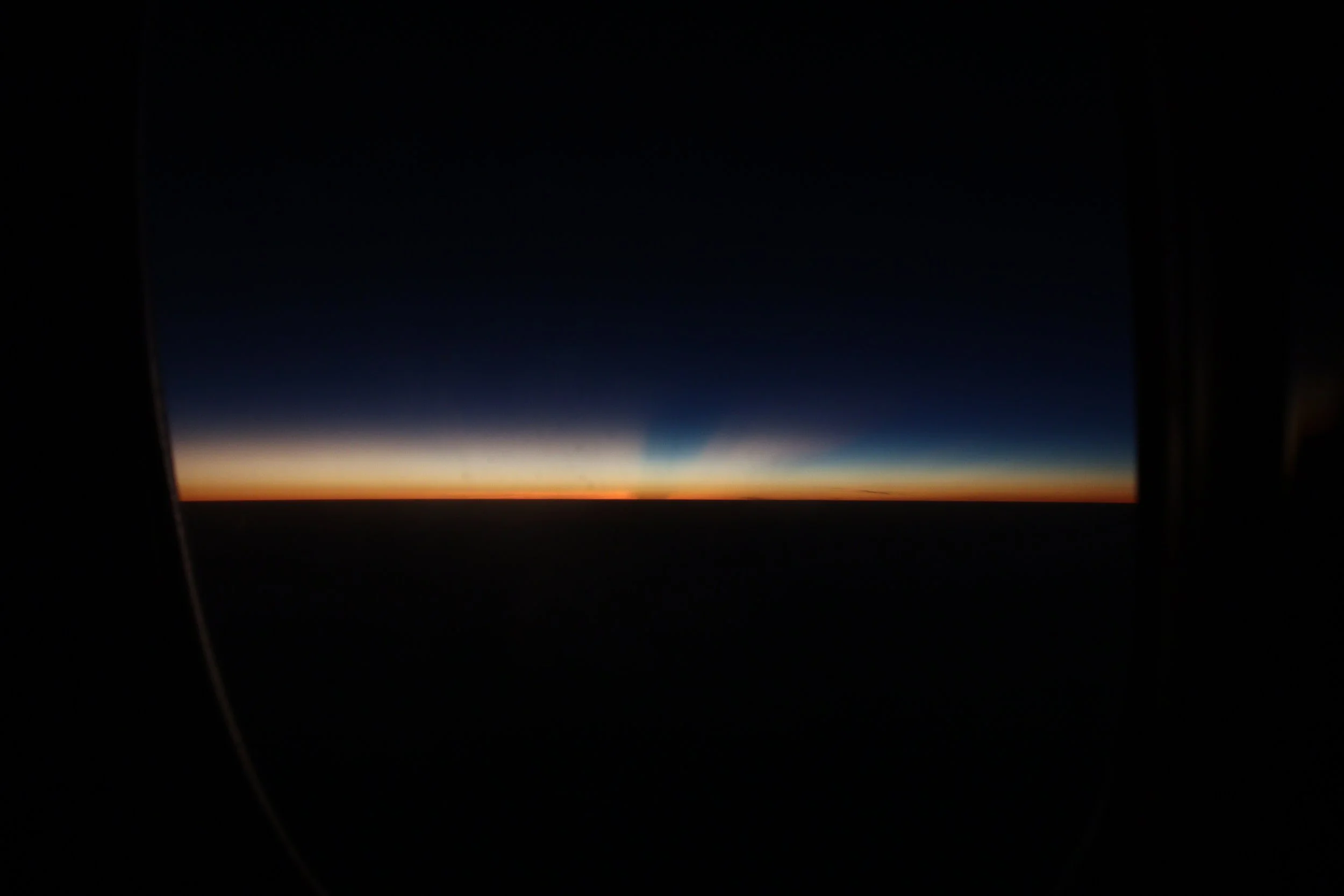 An ethereal sunset captured from a plane