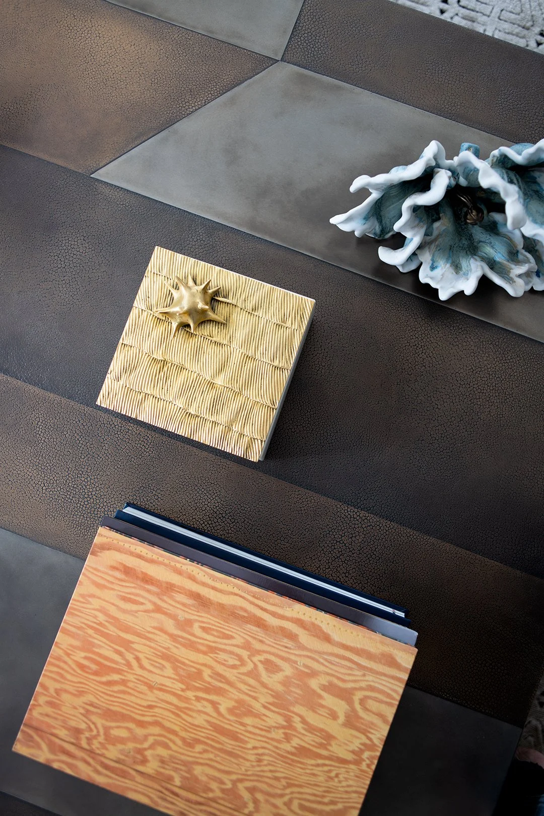 MATERIALS: Rich woods, brass, bronze, ceramic, woven textiles, mohair velvet, leather and silk