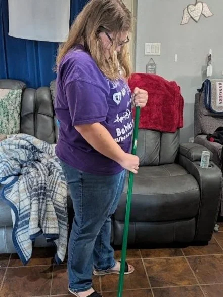 Doula Melanie Powell provides postpartum support through house light housekeeping.