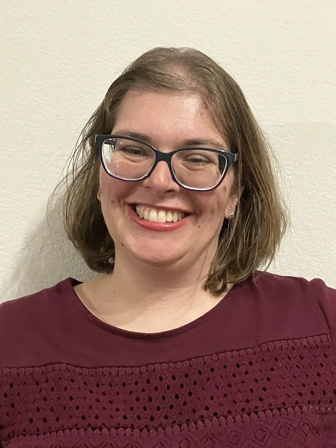 "Doula Melanie Powell smiling welcoming in families to her servant hearted doula care."