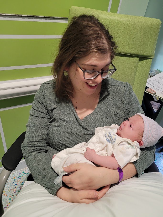 Postpartum Doula Melanie Powell offers comprehensive fait-based support through postpartum specializing in in-home care of the whole family.