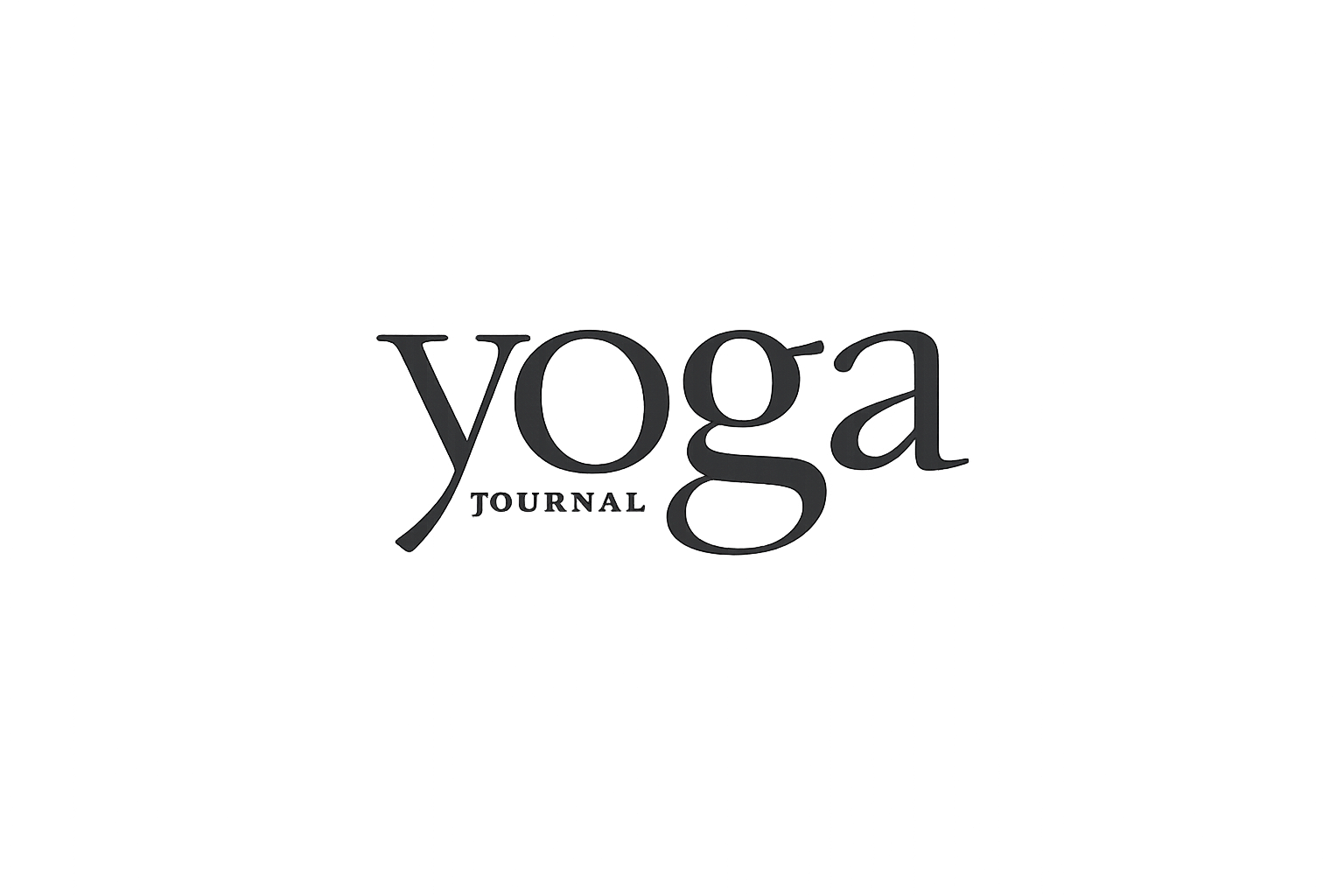 Cover of Yoga Journal magazine with the title 'Yoga Journal' in black text on a black background.