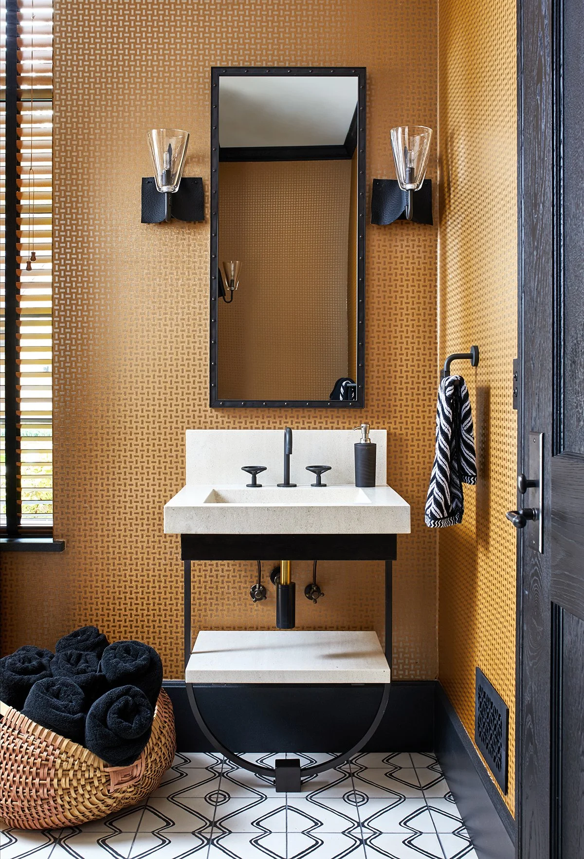 gold and black guest bathroom