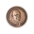 A coin with a portrait of a man.