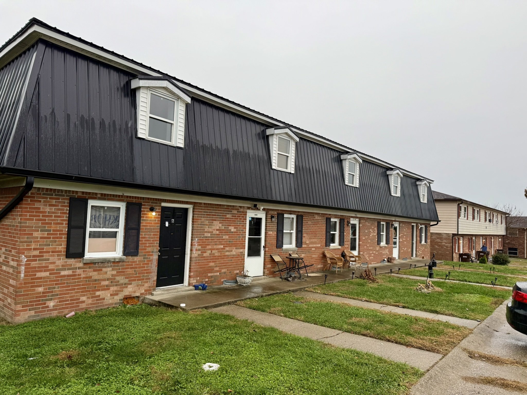 Elkhorn Rain Gutters black seamless gutter installation Richmond Kentucky