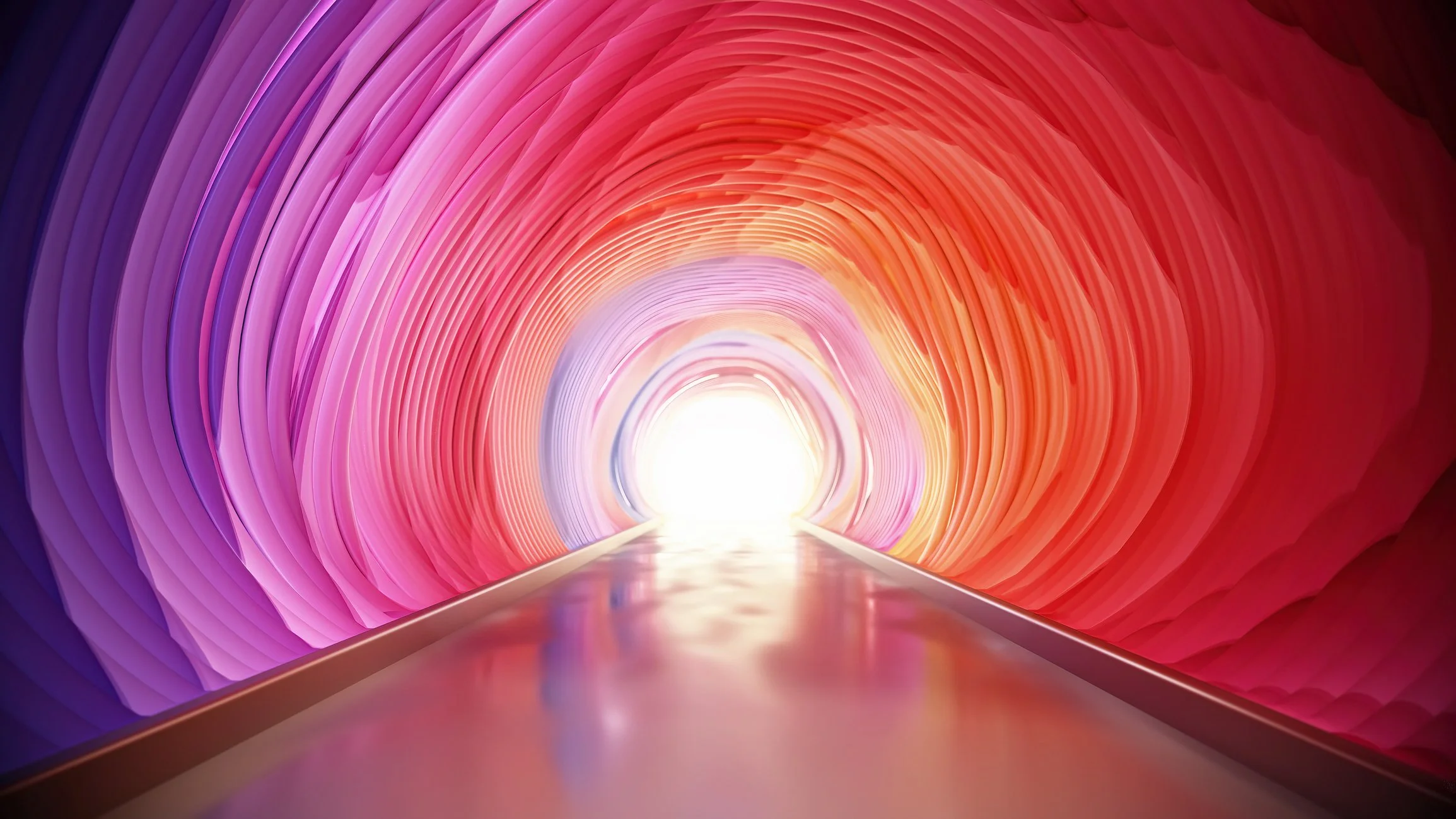 Bright light at the end of a colorful tunnel with pink, purple, red, orange, and yellow hues.