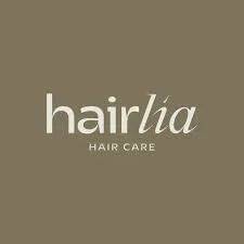 Logo de soins capillaires avec le texte 'hair lia HAIR CARE' sur un fond beige