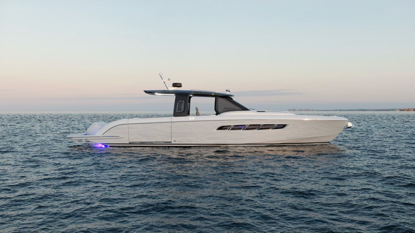 A modern luxury yacht sailing on calm open waters during sunset.