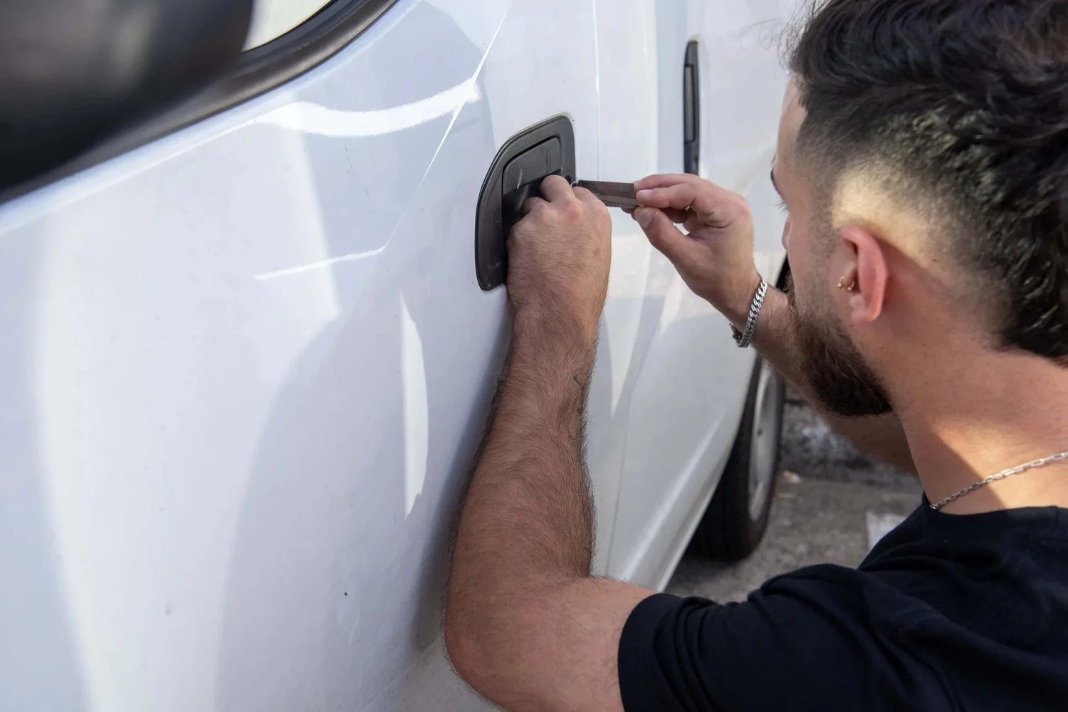 Locksmith Republic technician picking a vehicle door lock without damage