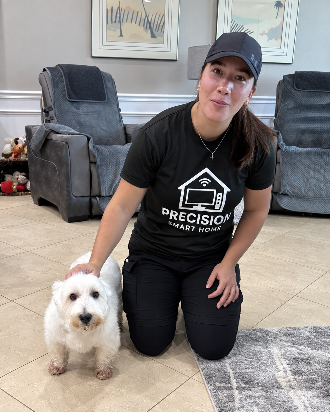 Precision Smart Home team member with a dog during a home service appointment in Tampa Bay