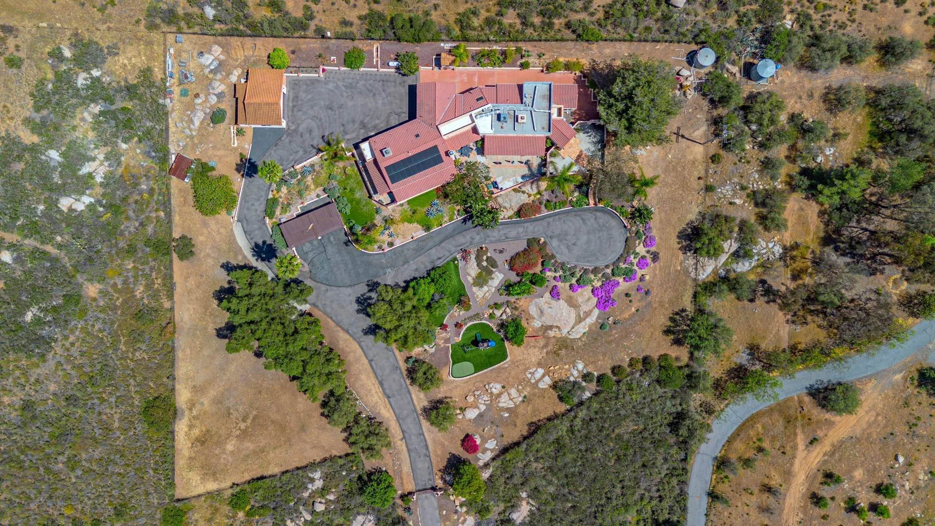 Aerial top down drone photography of a luxury house  and it's surroundings. Photographed for a San Diego County real estate listing. 