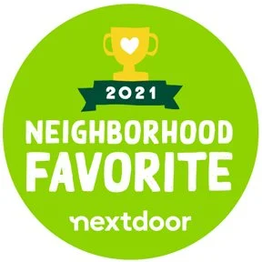 Green circular badge with a gold trophy at the top, '2021 NEIGHBORHOOD FAVORITE' in bold white letters, and the 'nextdoor' logo at the bottom.