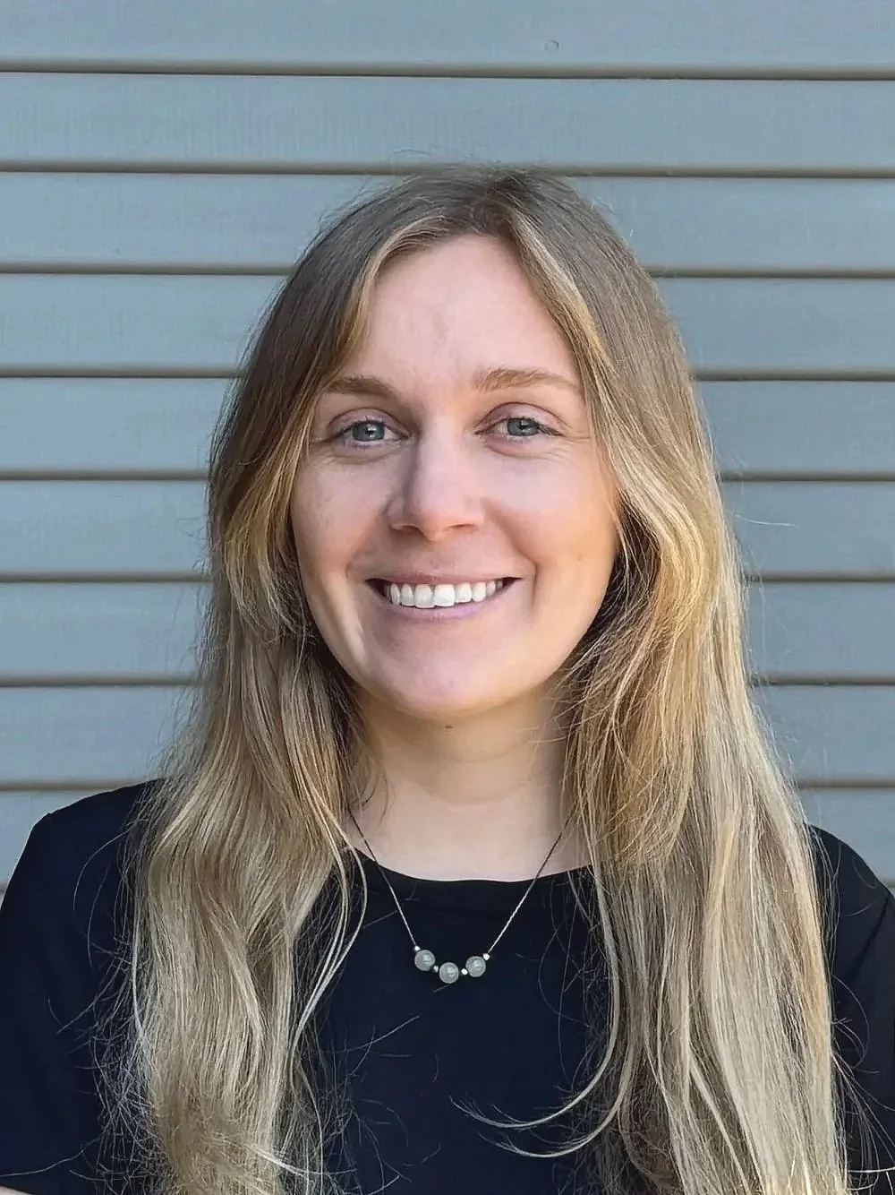 Headshot of Raleigh - Office Operations & Administrative Manager