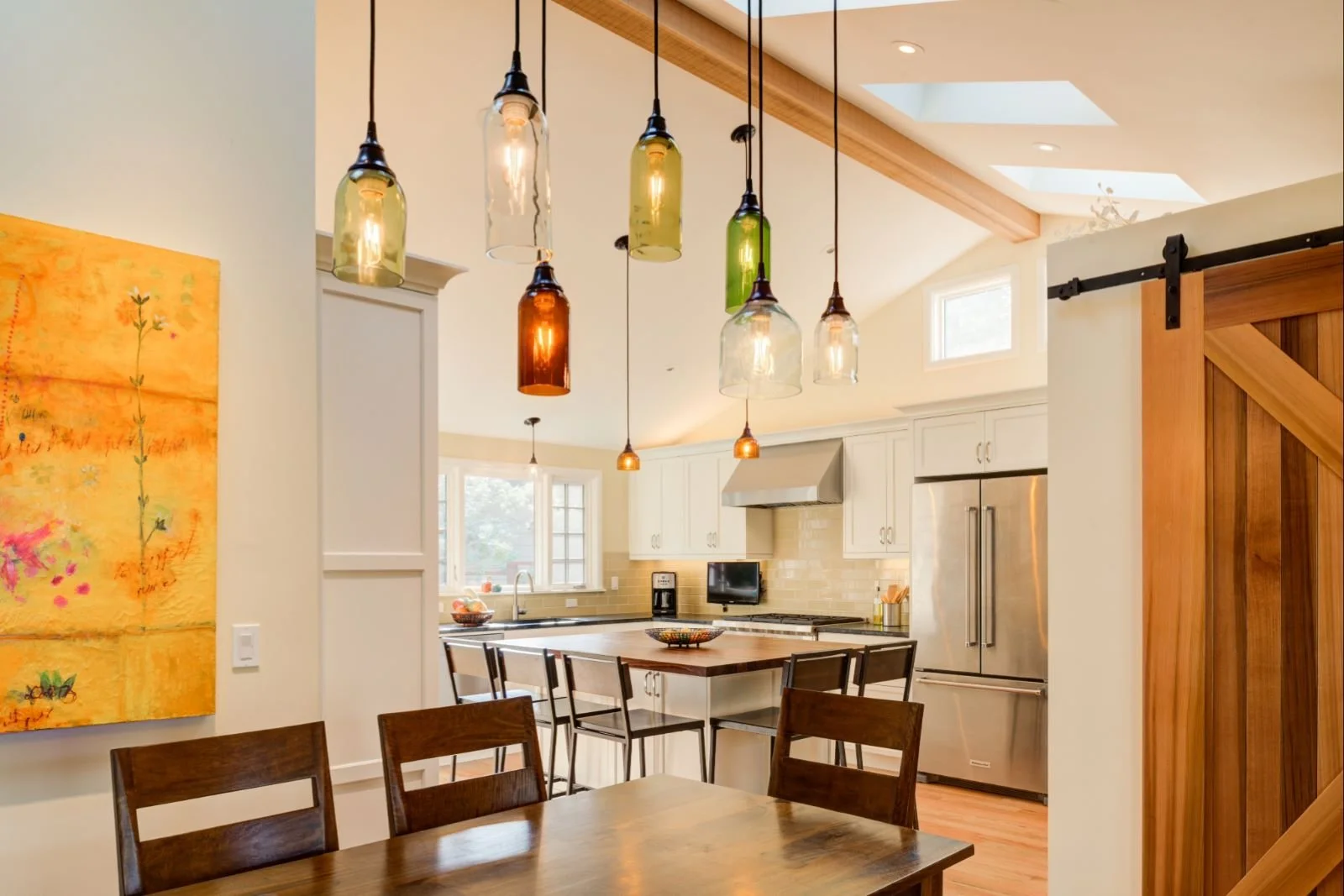 Expanded Dining Room and Kitchen. New Full Bath is behind the barn door at the right.