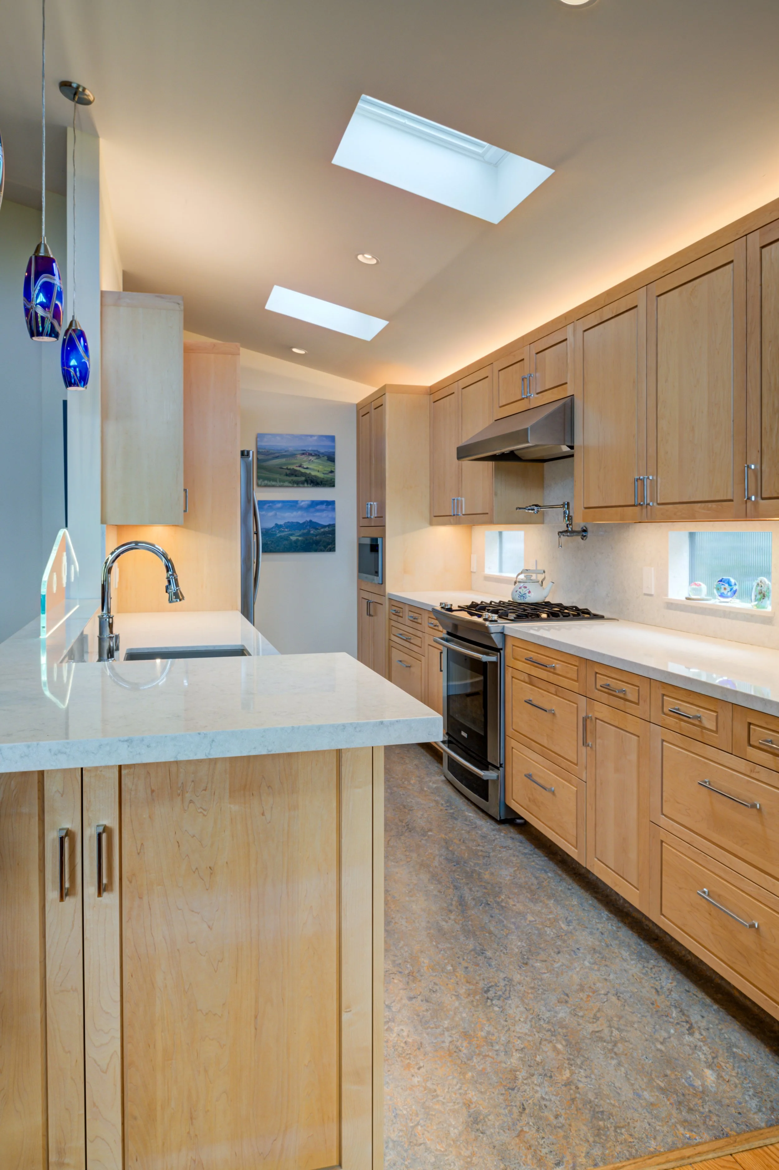 New Kitchen with skylights and backsplash windows
