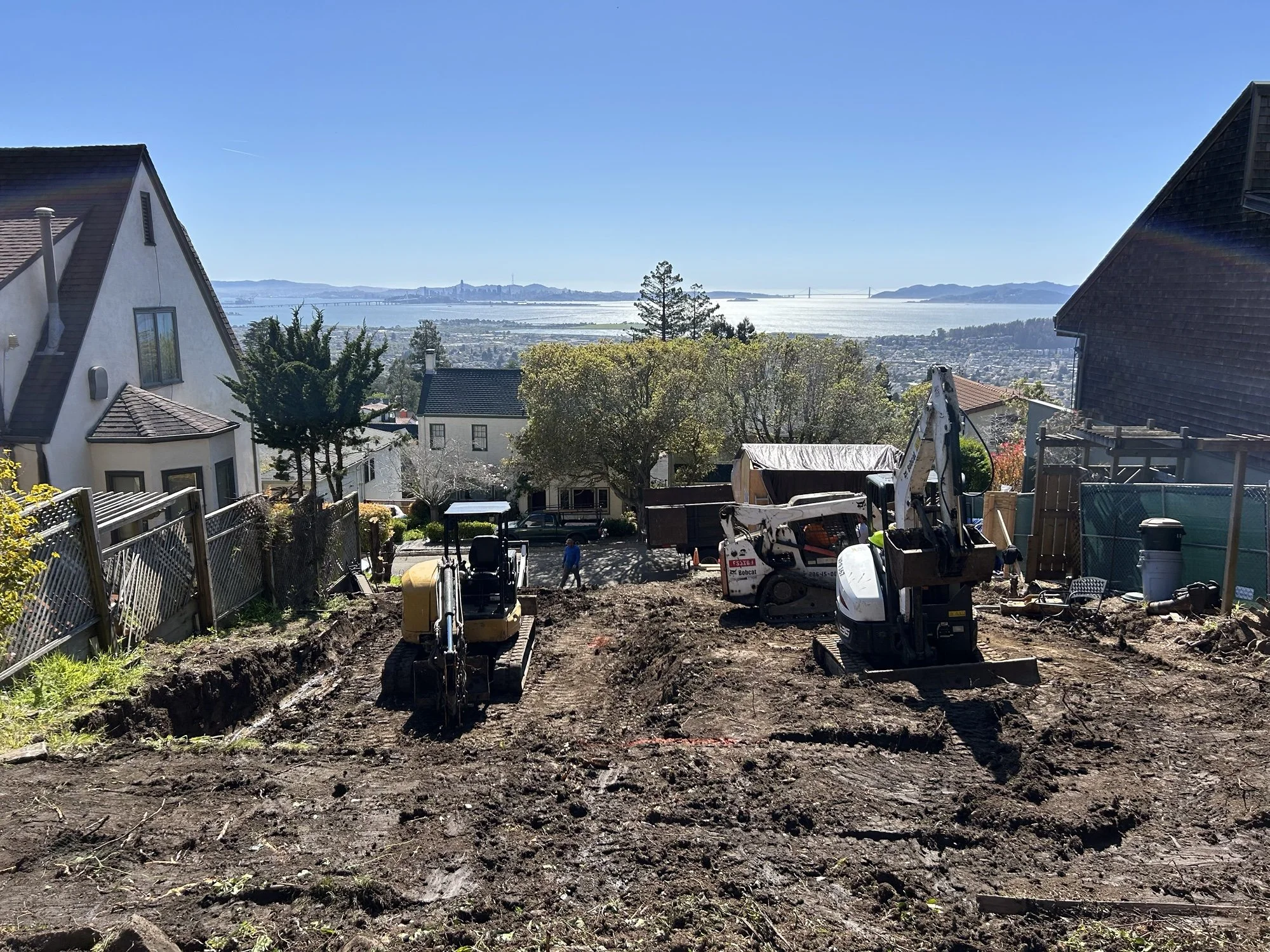 The old home has been removed. Heavy equipment overlooks the Bay views.