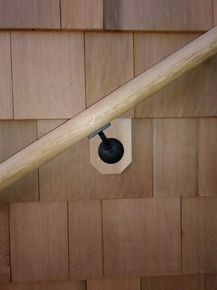 Close-up of new deck railing detail on the lift addition, preserving traditional character.