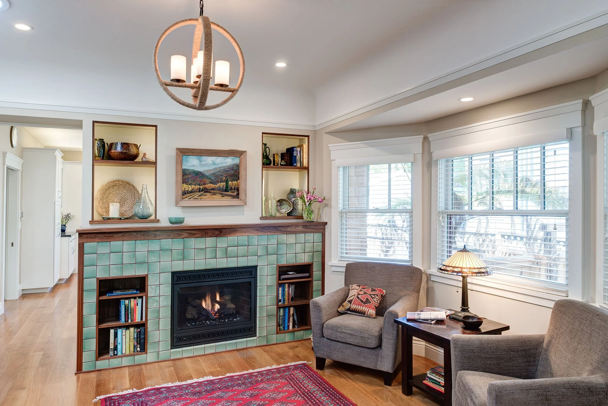 Living room with new gas fireplace replacing original chimney