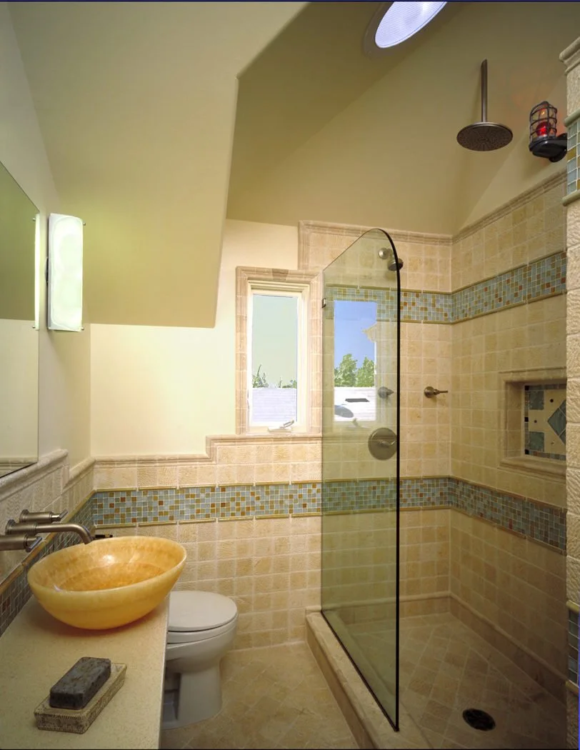 Remodeled bathroom with clean finishes and efficient fixtures, designed for water savings and comfort as part of Levitch award winning Berkeley green home remodel and addition.