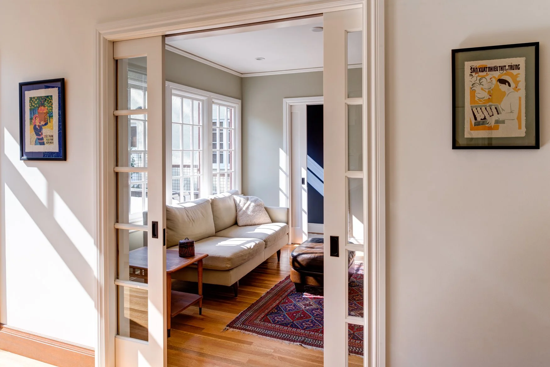 An expanded study adjacent to the remodeled kitchen, created through layout reconfiguration and the small corner addition.