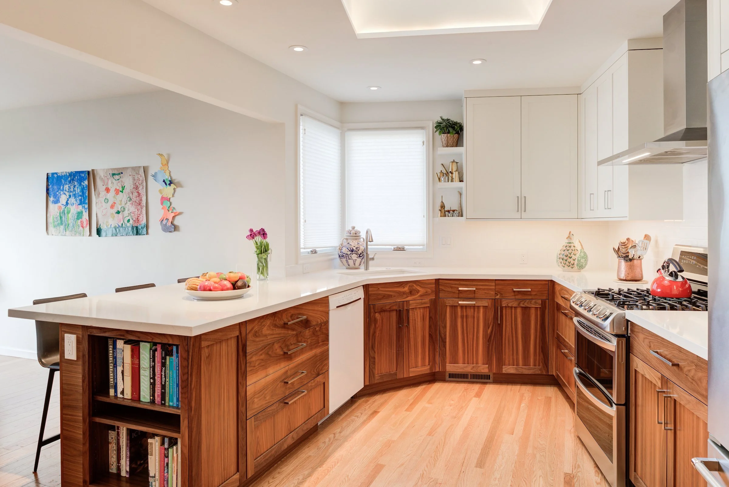Kitchen illustrating the open concept of the Kitchen and Dining Rooms. A peninsula offers seating and storage.