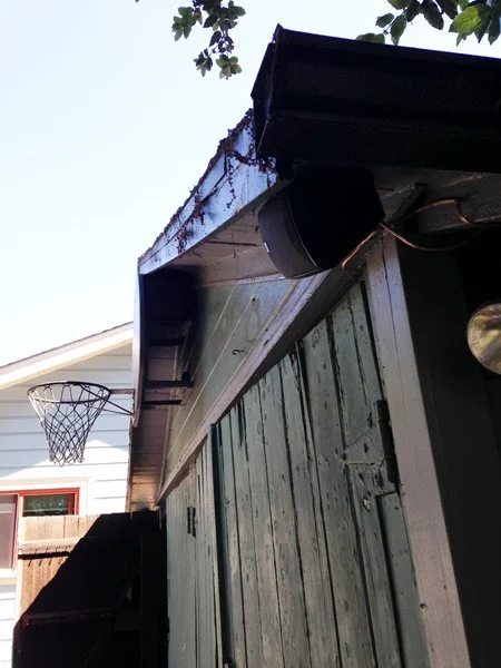 Carriage doors at front of old garage