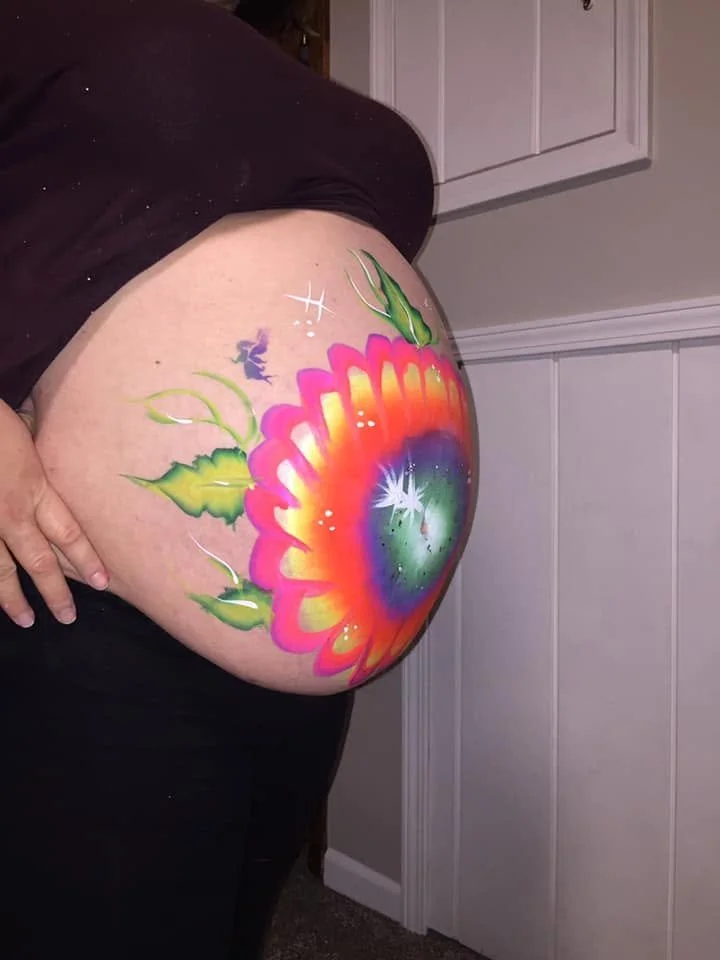 Painted a baby bump right before they were born. 