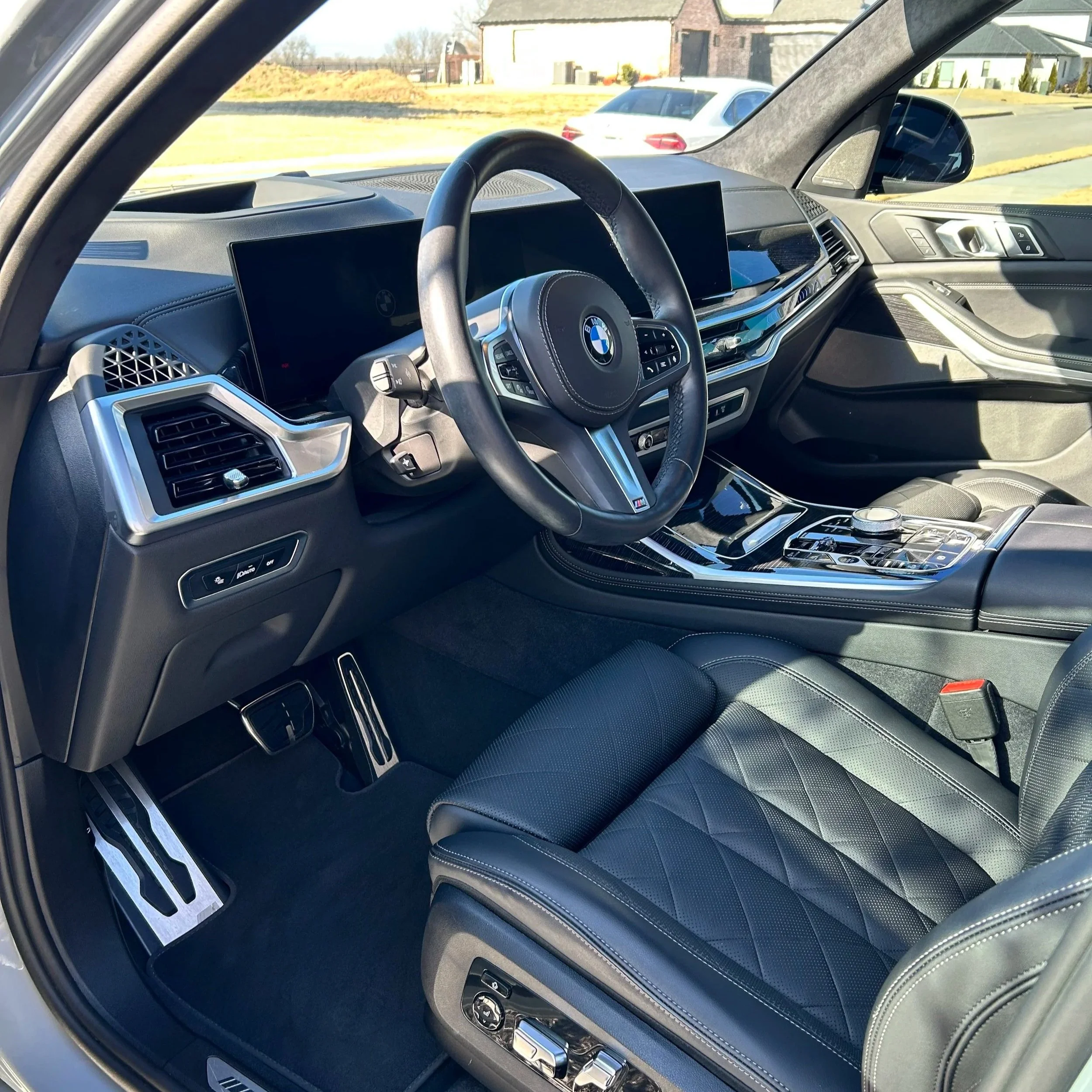 Detailed driver area interior of BMW X7 after professional interior detailing