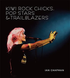 Book cover titled 'Kiwi Rock Chicks, Pop Stars & Trailblazers' by Ian Chapman, featuring a woman with pink hair singing into a microphone on stage, with a dark background.