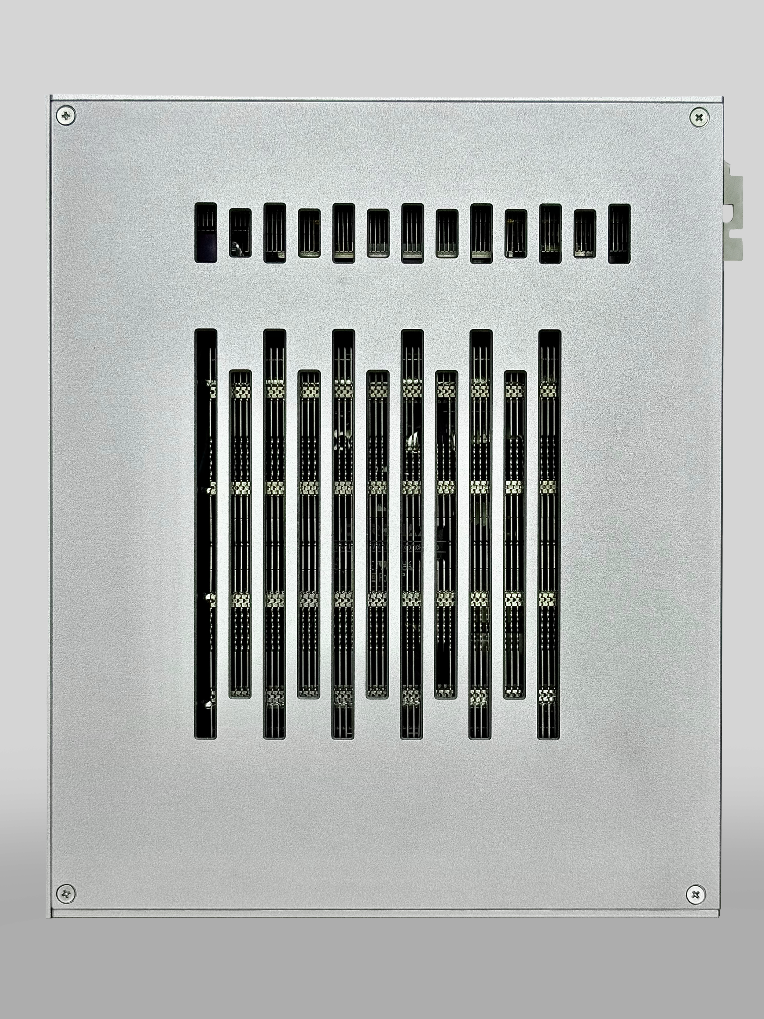 A metal electronic PC computer small form factor case with ventilation slots, possibly a computer or server component.