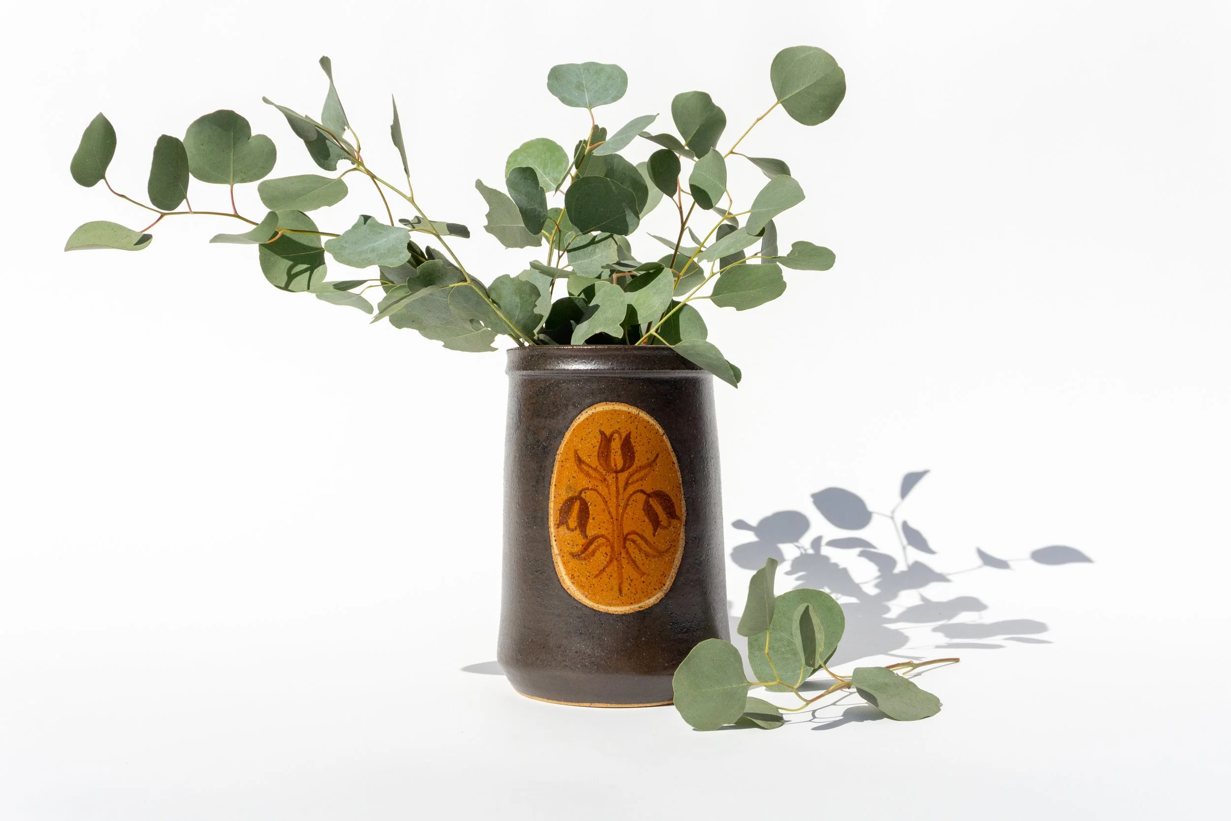 Brown Crock with Brown Flowers