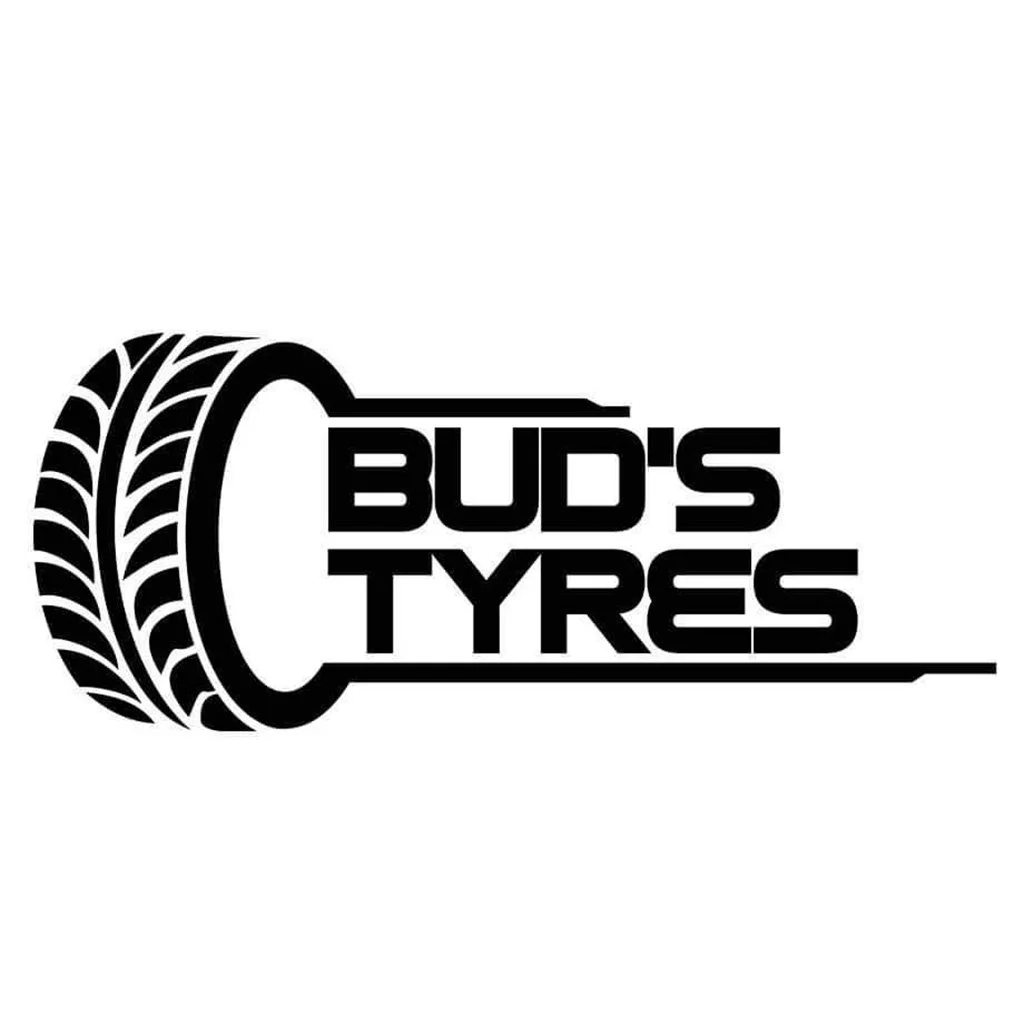Logo for Bud's Tyres with a stylized tire on the left and bold black text that reads 'Bud's Tyres' on the right.