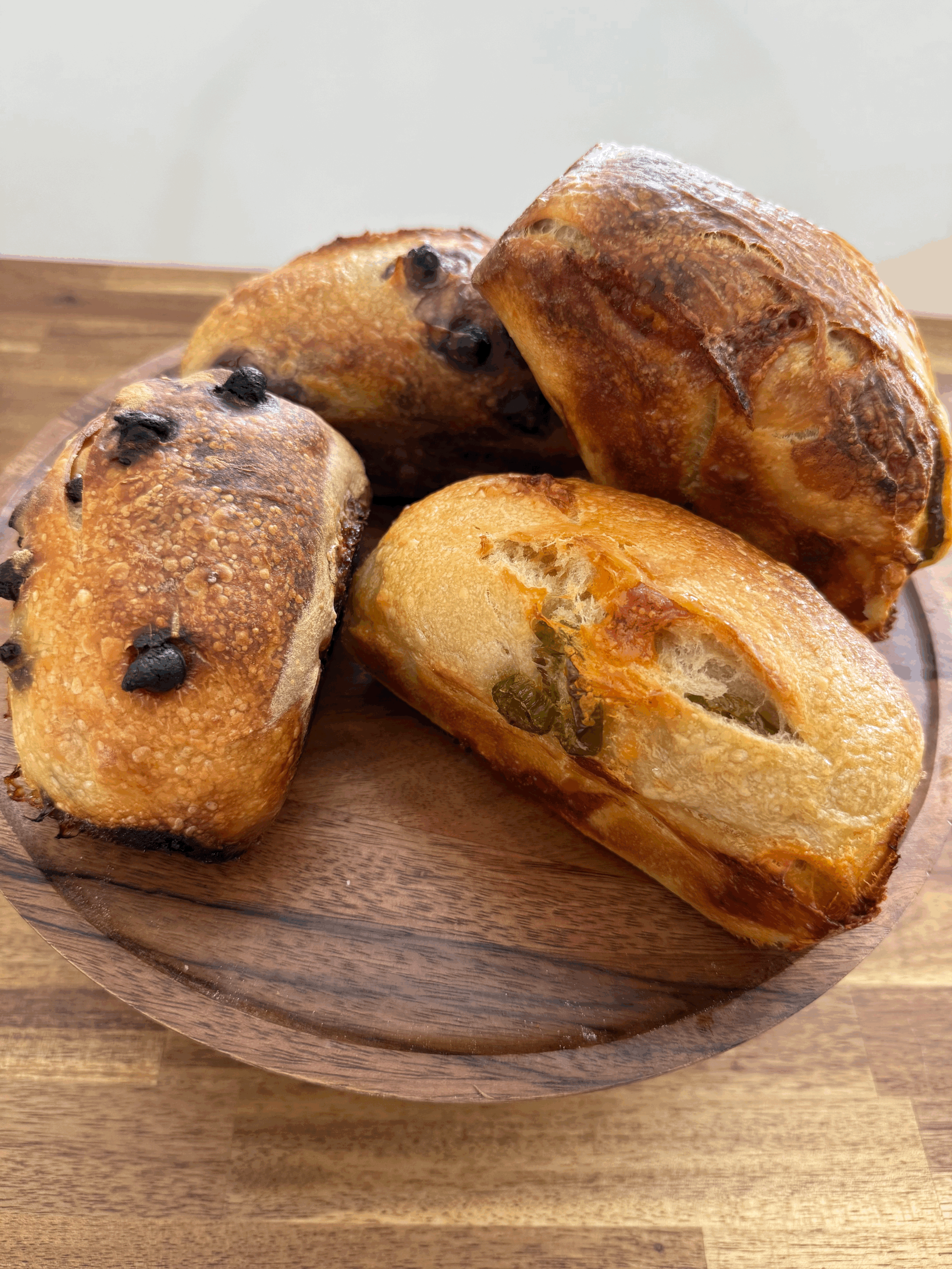 The Flock $12
Meet The Flock—our sourdough sampler that brings four mini loaves together in one flavor-packed bundle. Each flight features a rotating mix of both classic and creative flavors: from cinnamon sugar to pizza-inspired, blueberry lem