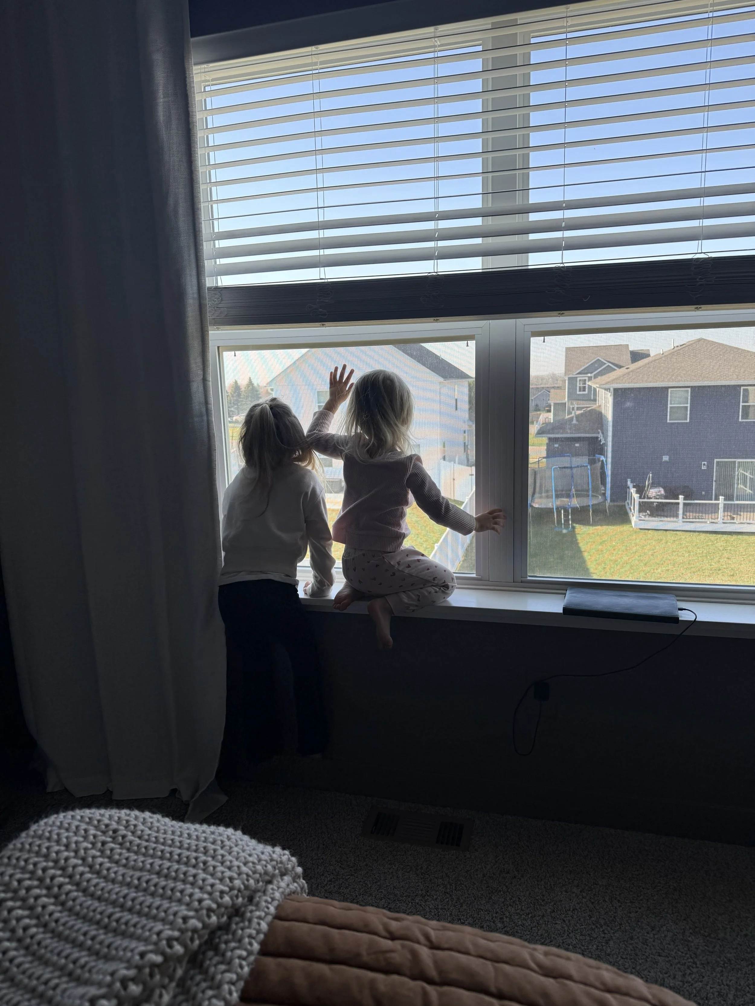 Watching Daddy at work just down the street!