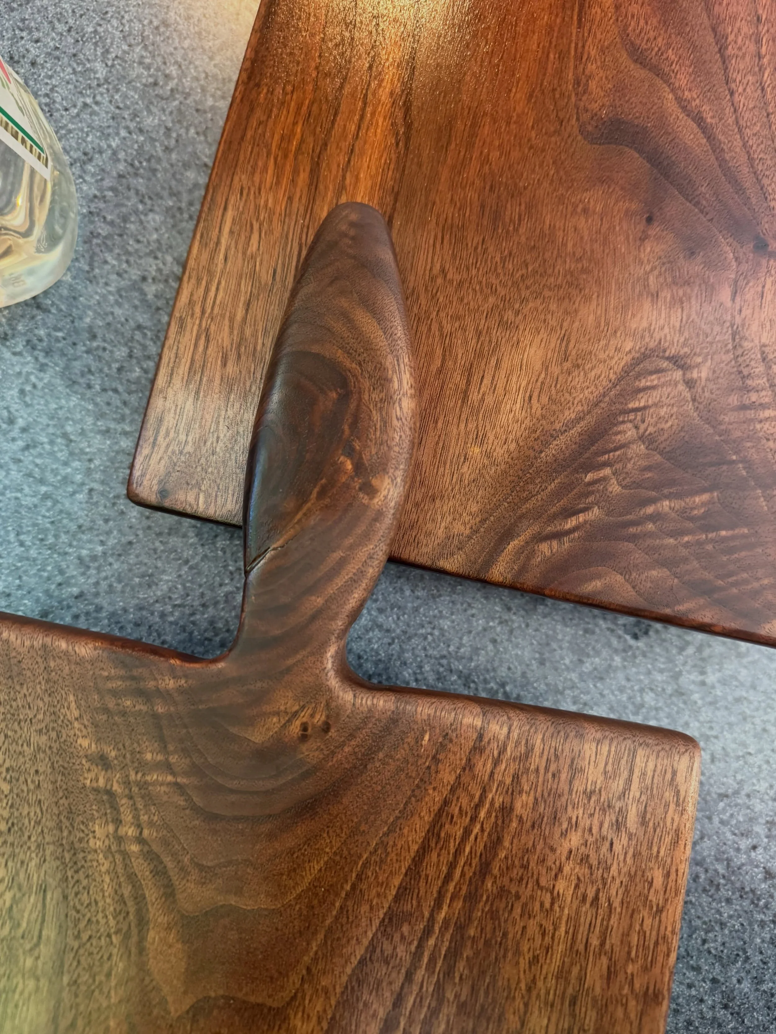 Sneak peek of 2 more charcuterie boards that will be ready for purchase soon. This was a gorgeous piece of black walnut that we ripped into multiple boards. These two share the same figuring around a knot that I turned into a handle for one of them. 